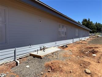 a freshly painted exterior of classroom building