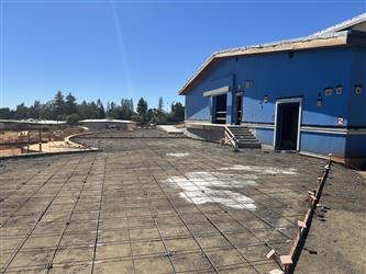 grid rebar put in place for a large concrete area around the multipurpose room